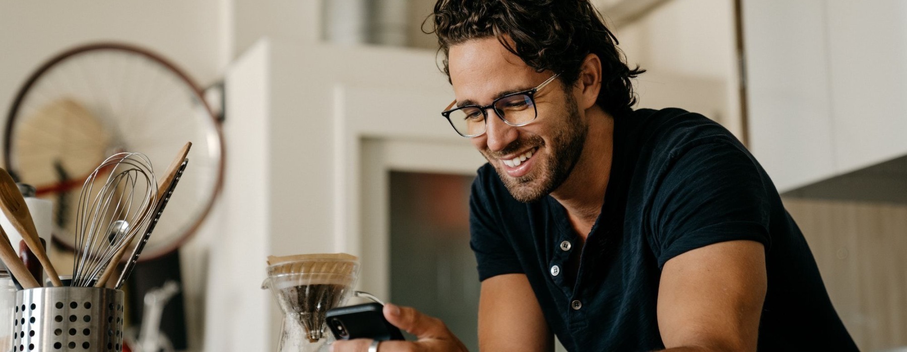 man looking at a phone